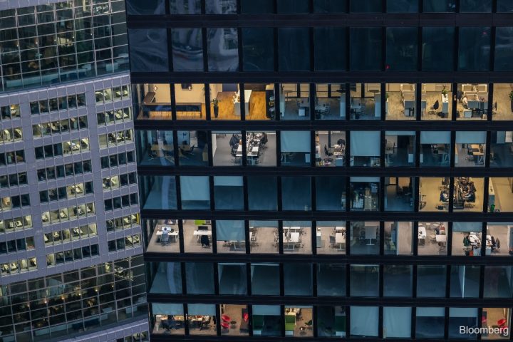 Office interiors in a European financial district building at dusk